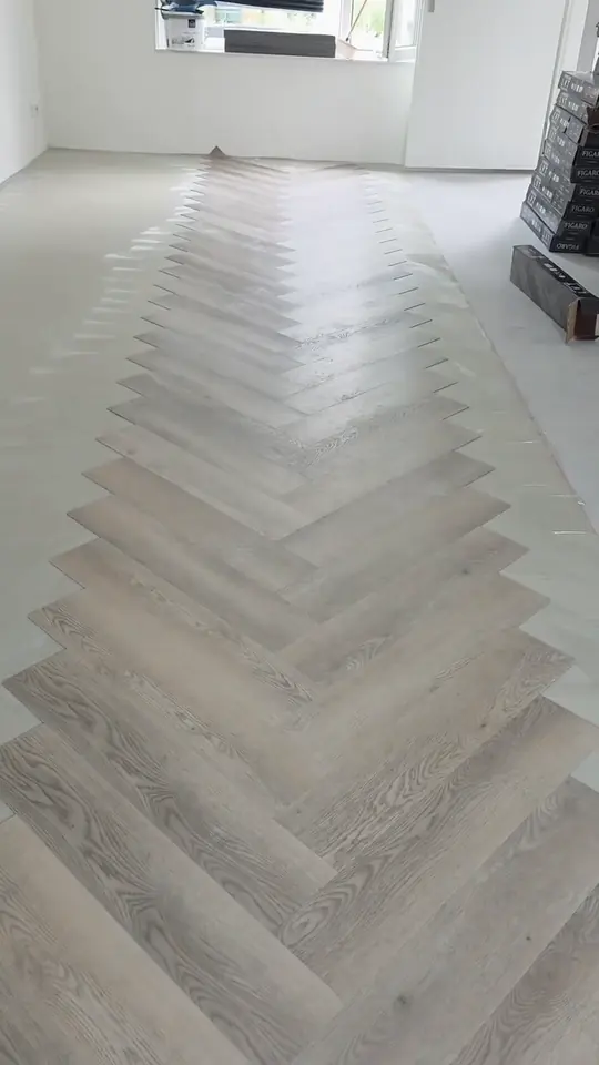 Grijze visgraat PVC-vloer